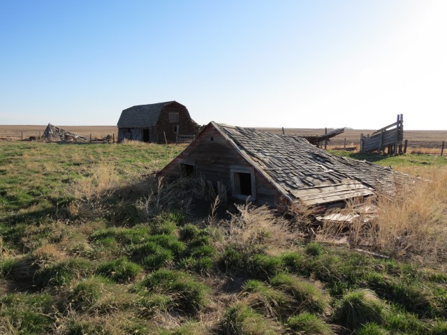 Barn and collapsed building