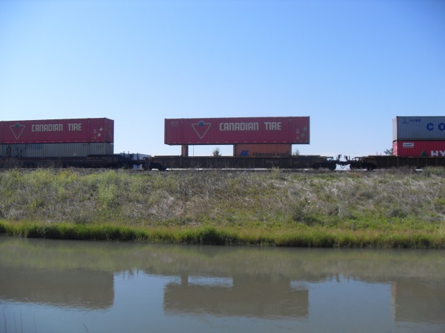 Train stacked containers