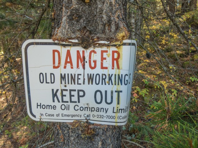 Old mine workings sign